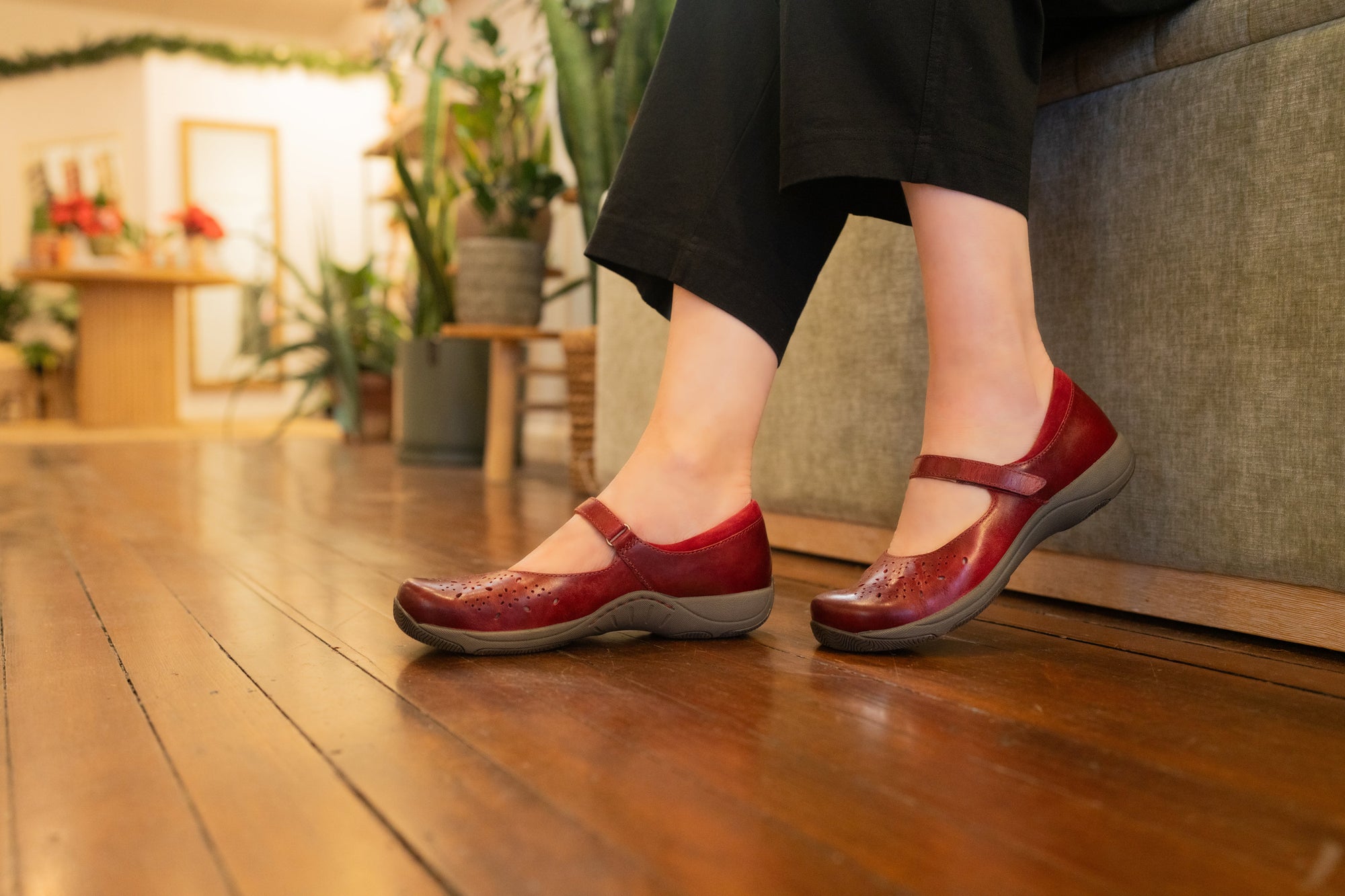 Two colorways of slip-on, lightweight sneakers on dark backdrop.