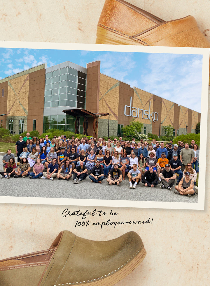 Dansko showing their owners, the employees, in front of distribution center. Text reads: Grateful to be 100% employee-owned!