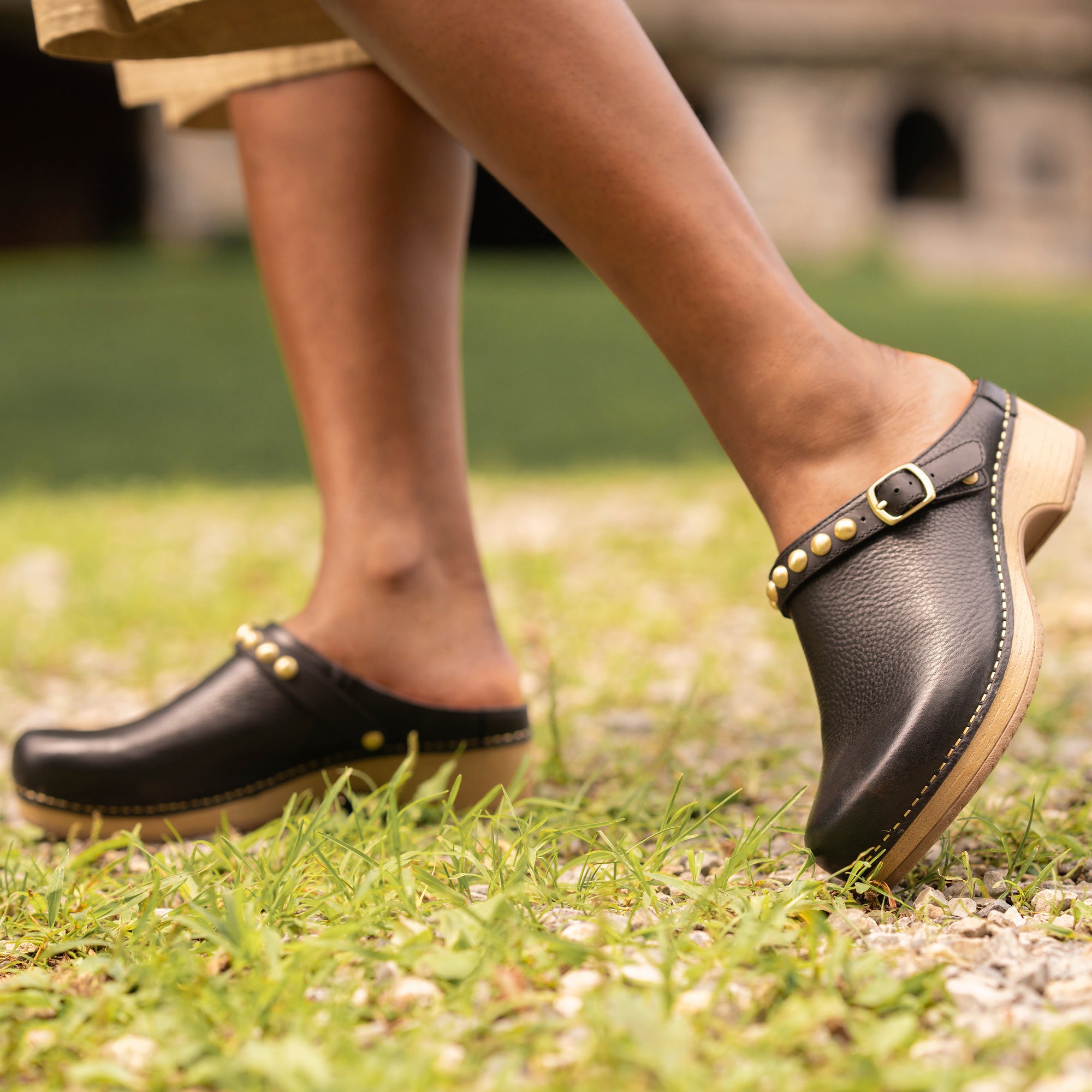Stylish black mule clog with trendy design.