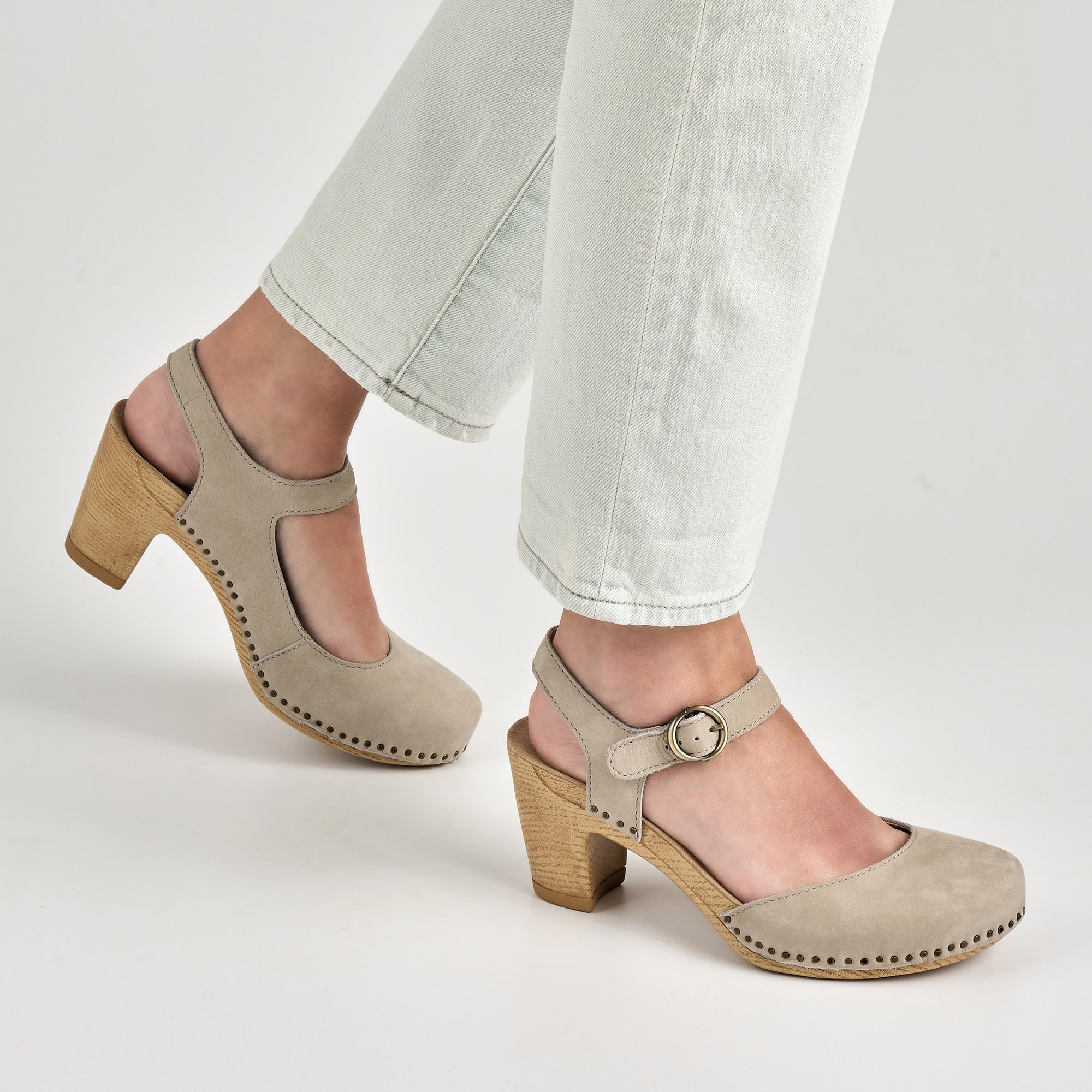 Close up of taupe heeled mary jane.