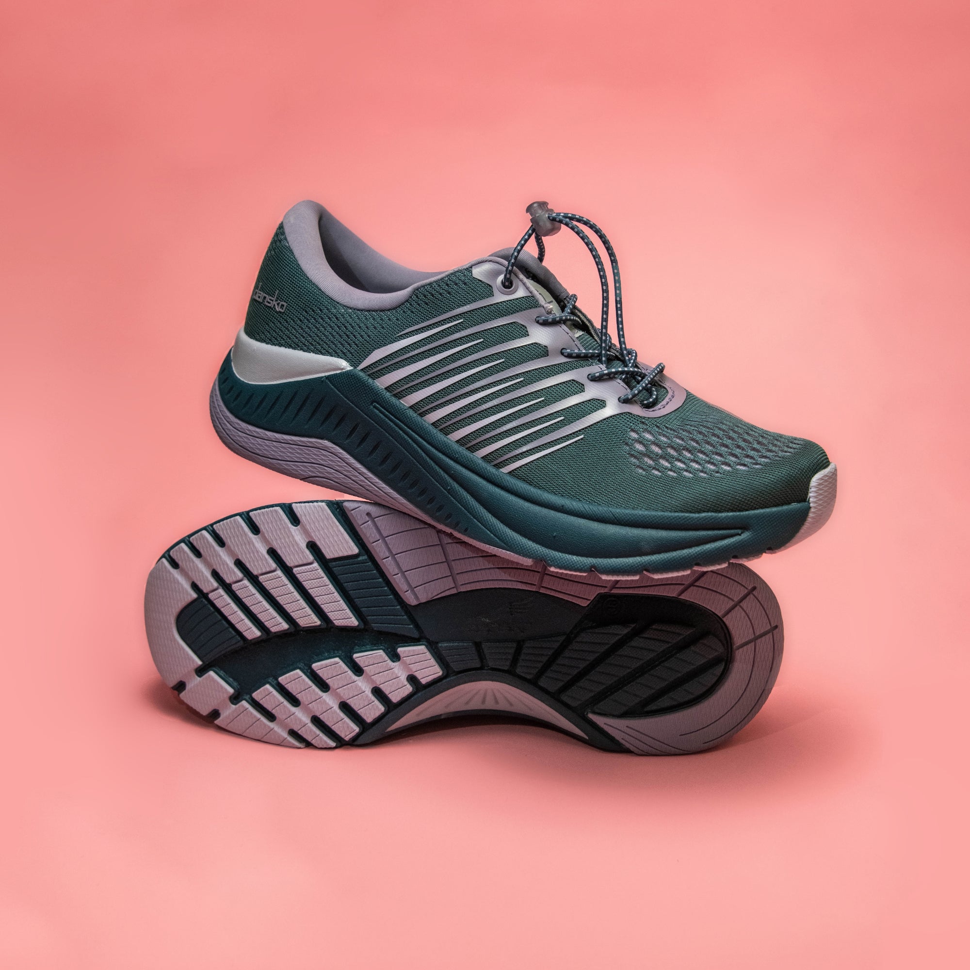 Penni in a premium walking shoe with easy toggle adjustability and grippy tread for easy wear and all-day support.