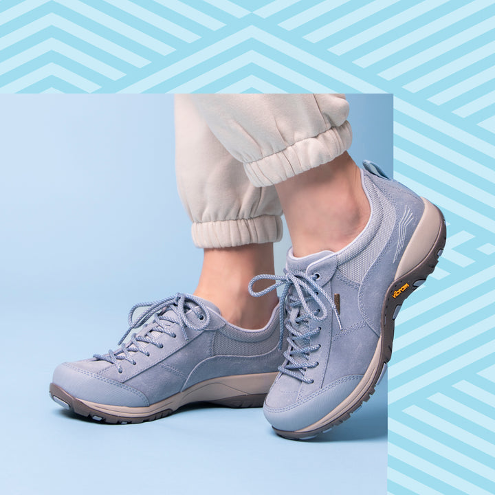 Light blue walking shoes with durable rubber outsoles.