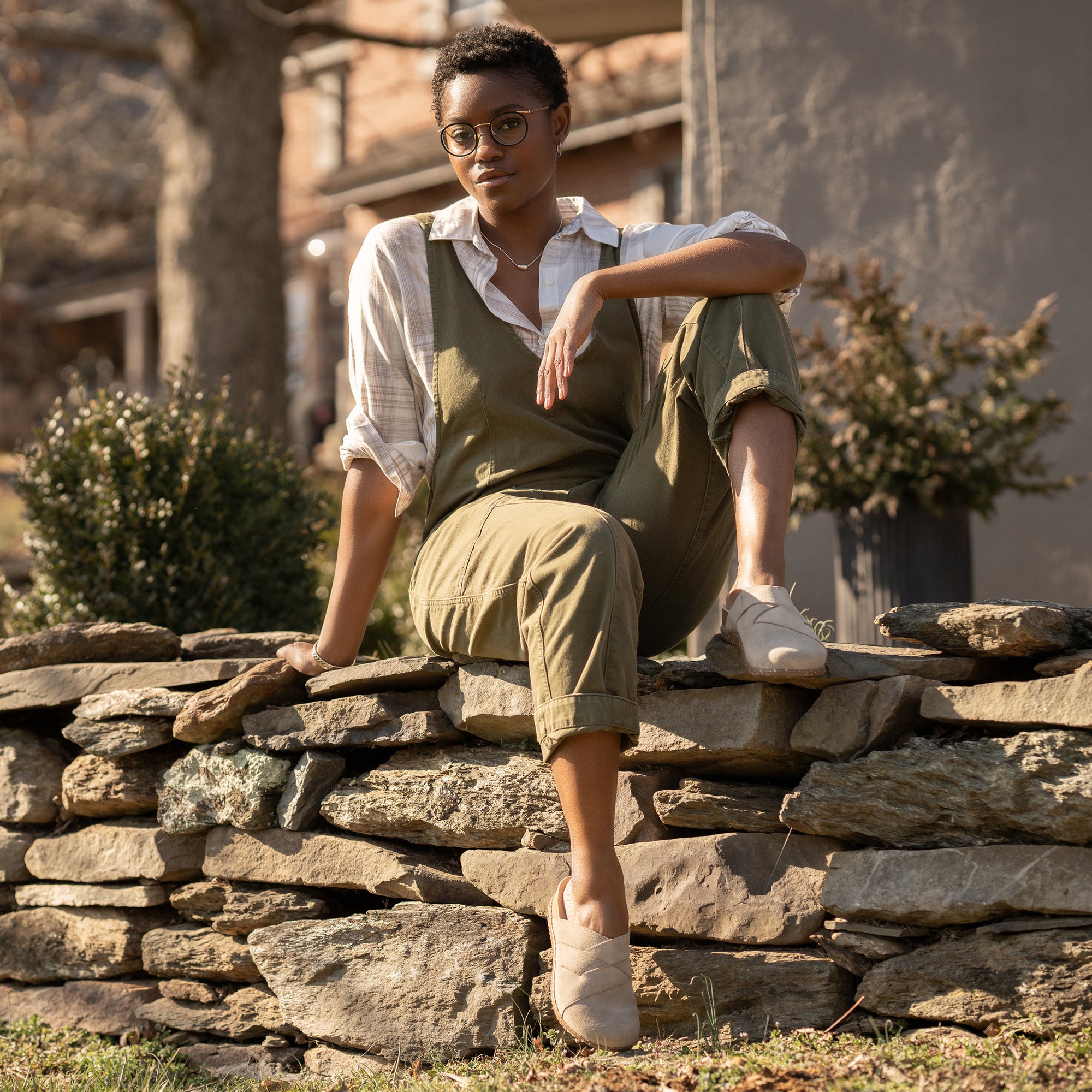 Casual outdoor wear in tan suede slides with a cork sole.