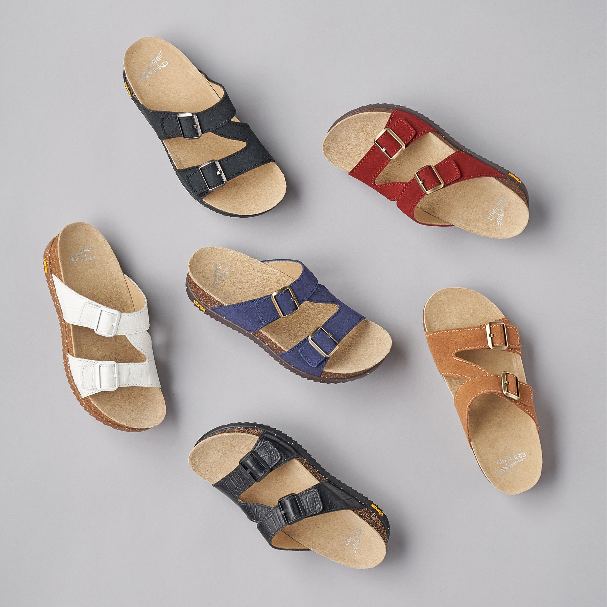A cork-footbed sandal shown in six different color and leather options.