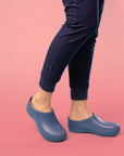 Keep your footing for your whole shift thanks to the patented slip-resistance of our molded occupational clog, Kaci.