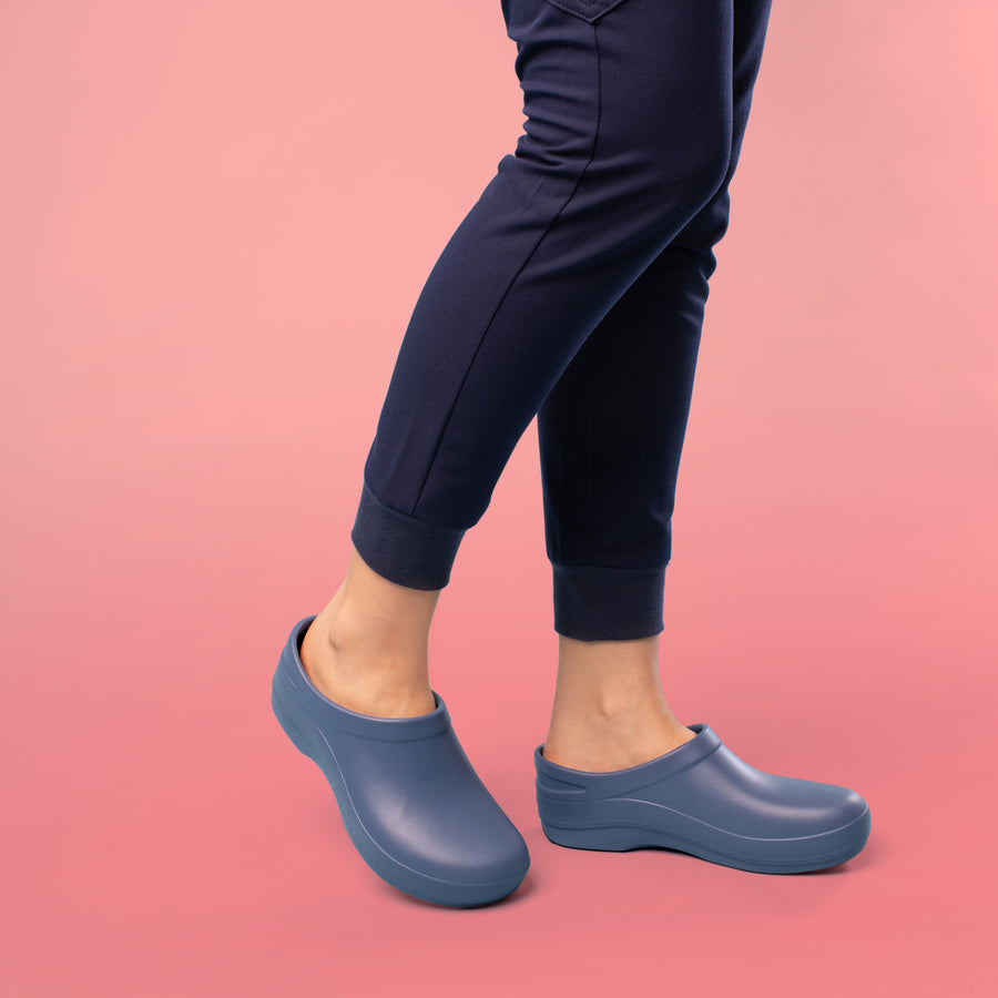 Keep your footing for your whole shift thanks to the patented slip-resistance of our molded occupational clog, Kaci.