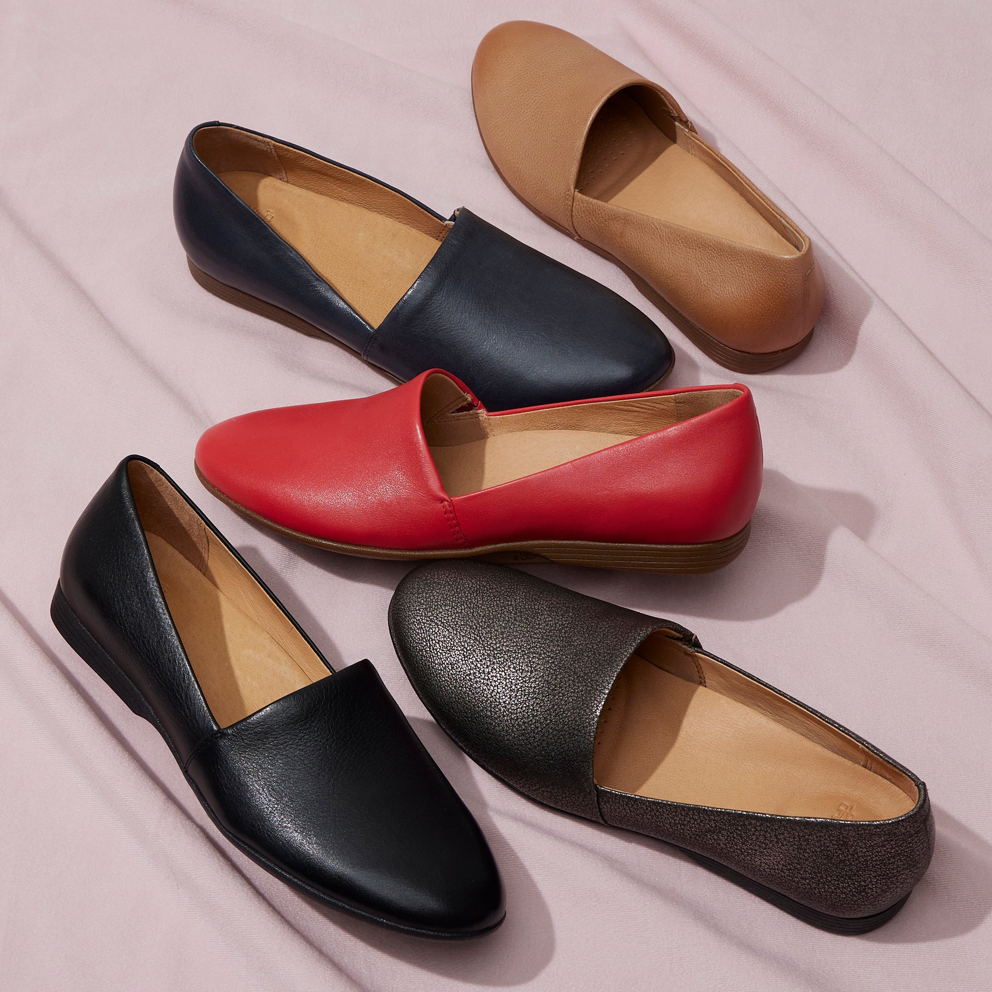 Different colors of a stylish and supportive flat shoe.