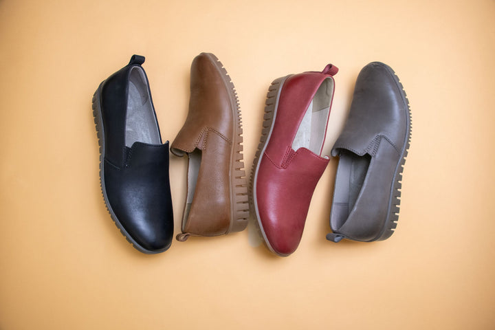 Four colors of lightweight slip-on loafers made with strong leathers and rubber outsoles.