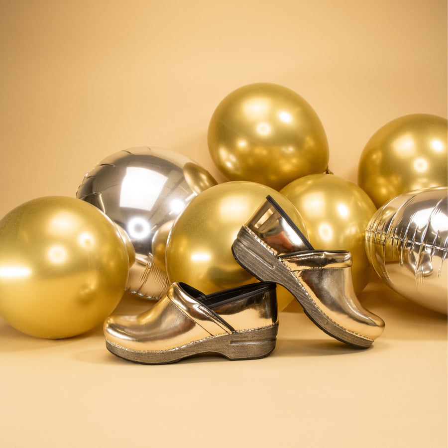 The Professional Chrome clog now comes in Gold for a standout style made with legendary Dansko support.