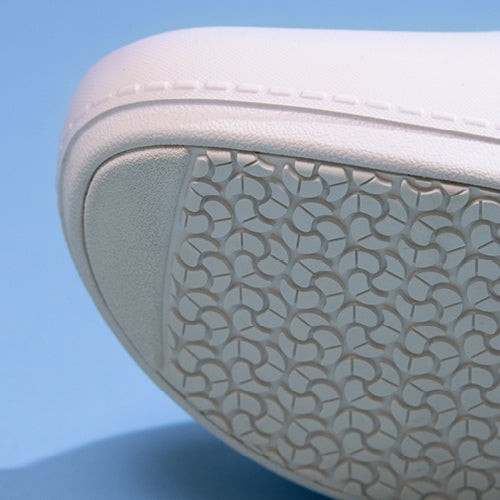Patented slip-resistant rubber outsoles from Dansko shown in detail.
