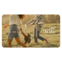 Gift card with a background image of two girls walking through a field holding their Dansko shoes, with the overlay text reading "Online Gift Card". The Dansko logo is overlaid on the right hand side.