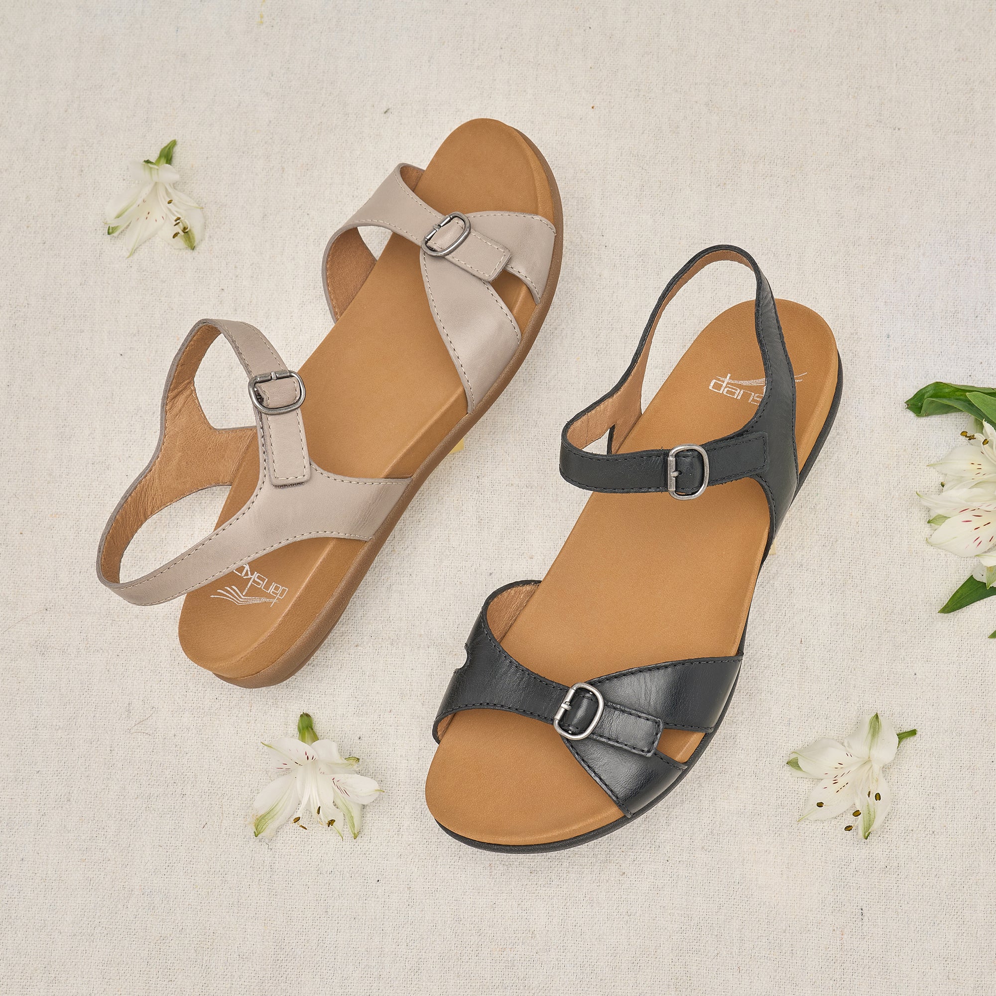 Two colors of a multi-strap flat sandal.