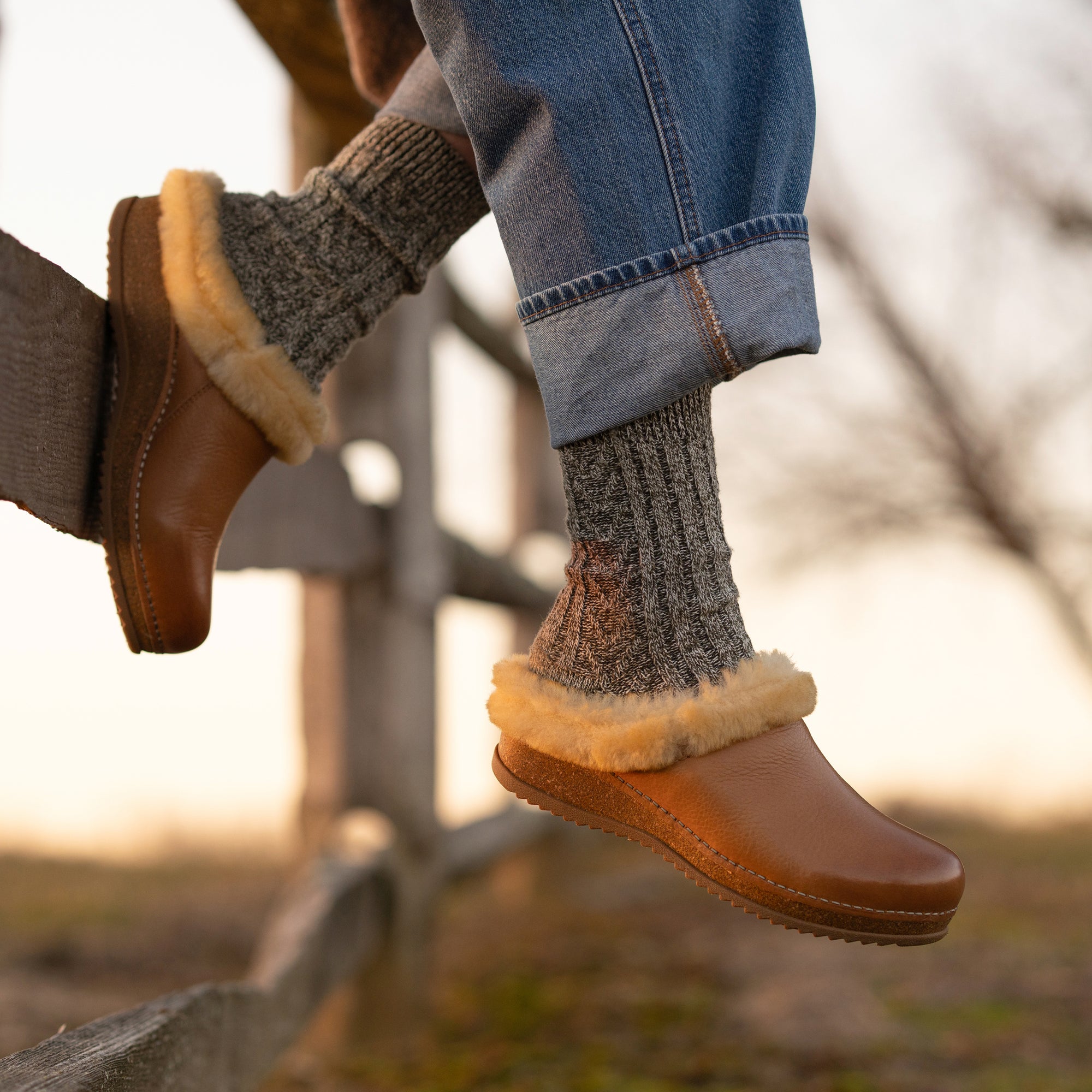 An on-foot look at shearling-lined mule clogs.