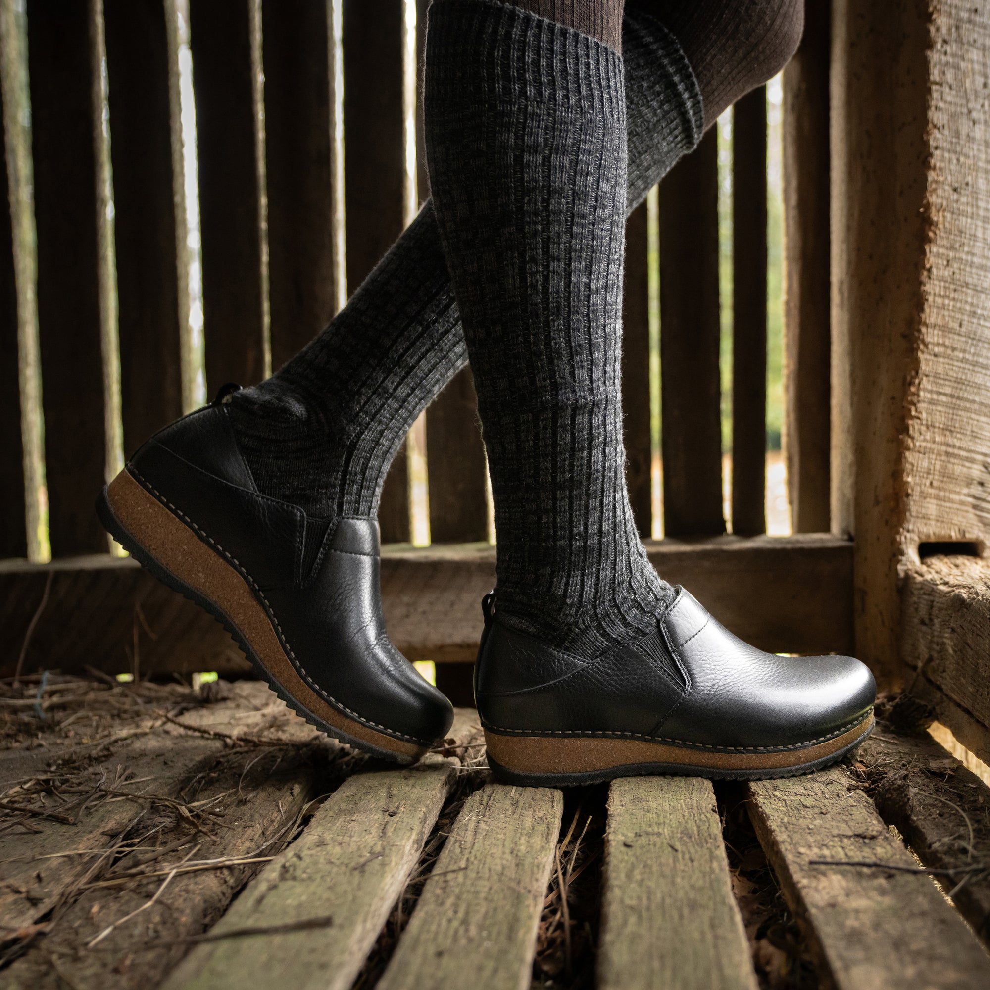 An on-foot look at a nontraditional black clog with double gore and cork soles