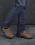 Brown Men's mule clogs with a supportive outsole.