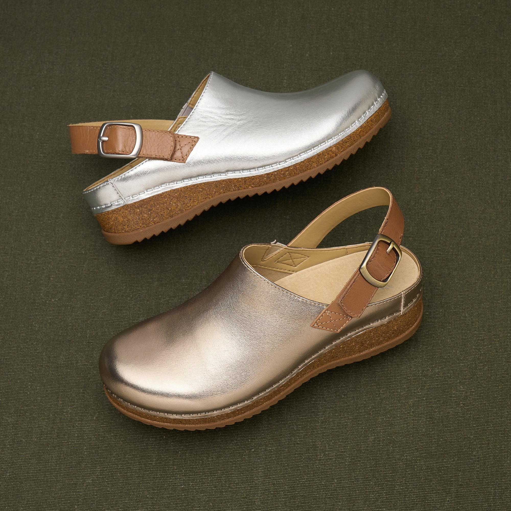 Silver and gold colorways of a heel-strap clog with a cork-based sole.