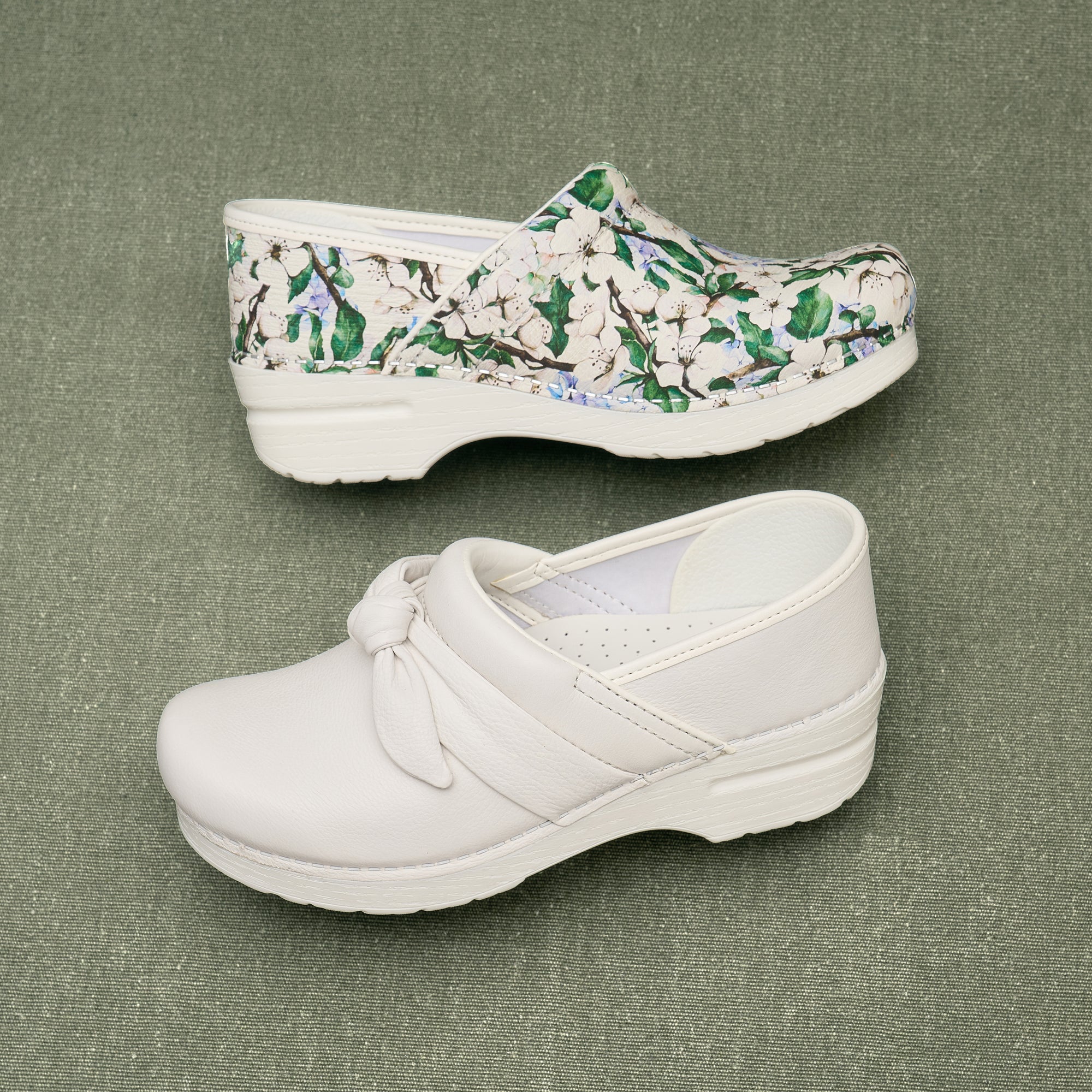 Two white-based exclusive clog styles.