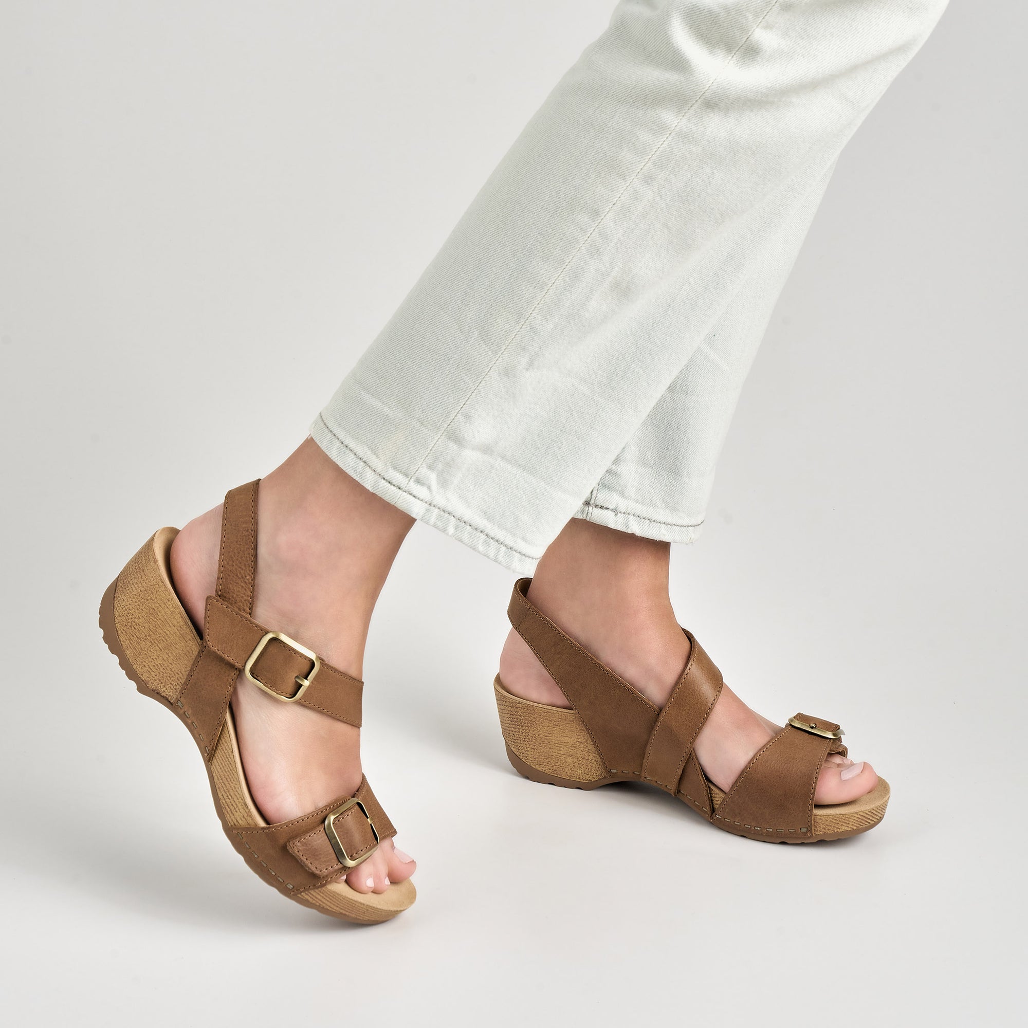 close up of tan heeled sandals.