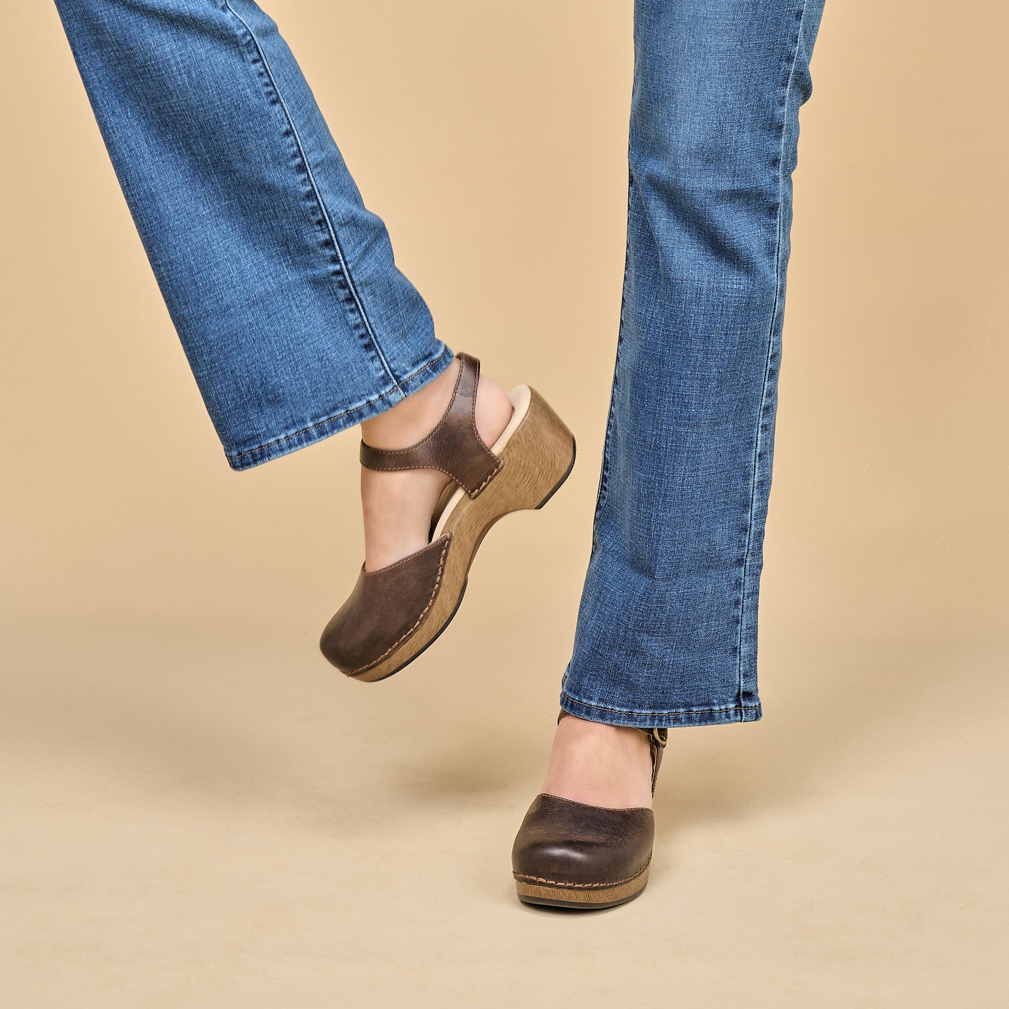 Brown Mary Jane Sandals on a faux wood sole that match great with denim.