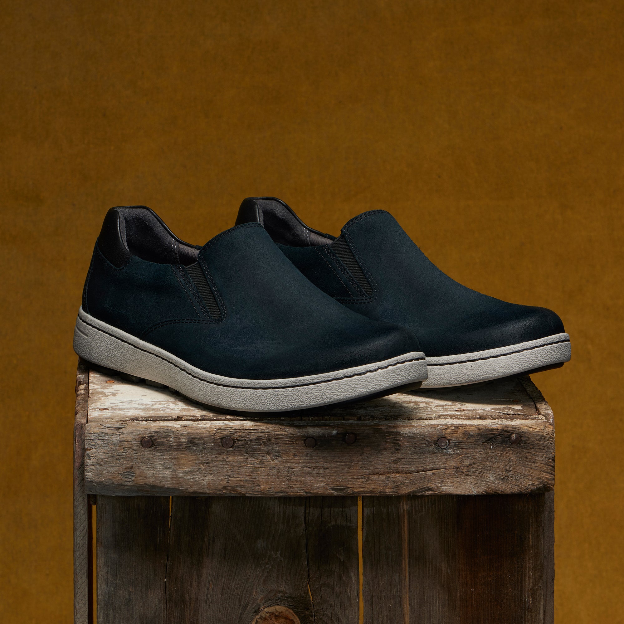 Men&#39;s slip-on sneakers in soft black leathers with a casual outsole.