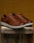 Men's slip-on sneakers in soft brown leathers with a casual outsole.