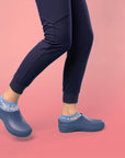 Keep your footing for your whole shift thanks to the patented slip-resistance of our molded occupational clog, Kaci.