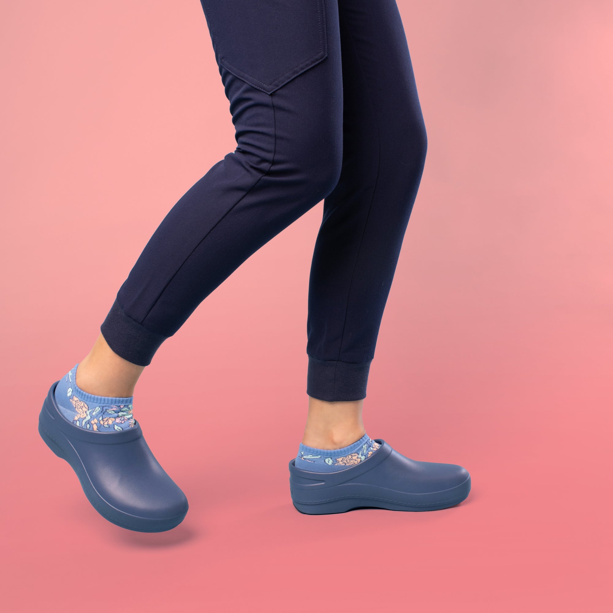 Keep your footing for your whole shift thanks to the patented slip-resistance of our molded occupational clog, Kaci.