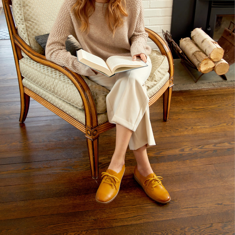 Dansko provides a lesson in support with Libbie in Mustard. Flexible construction and all-day support maximize the comfort of this stylish oxford.