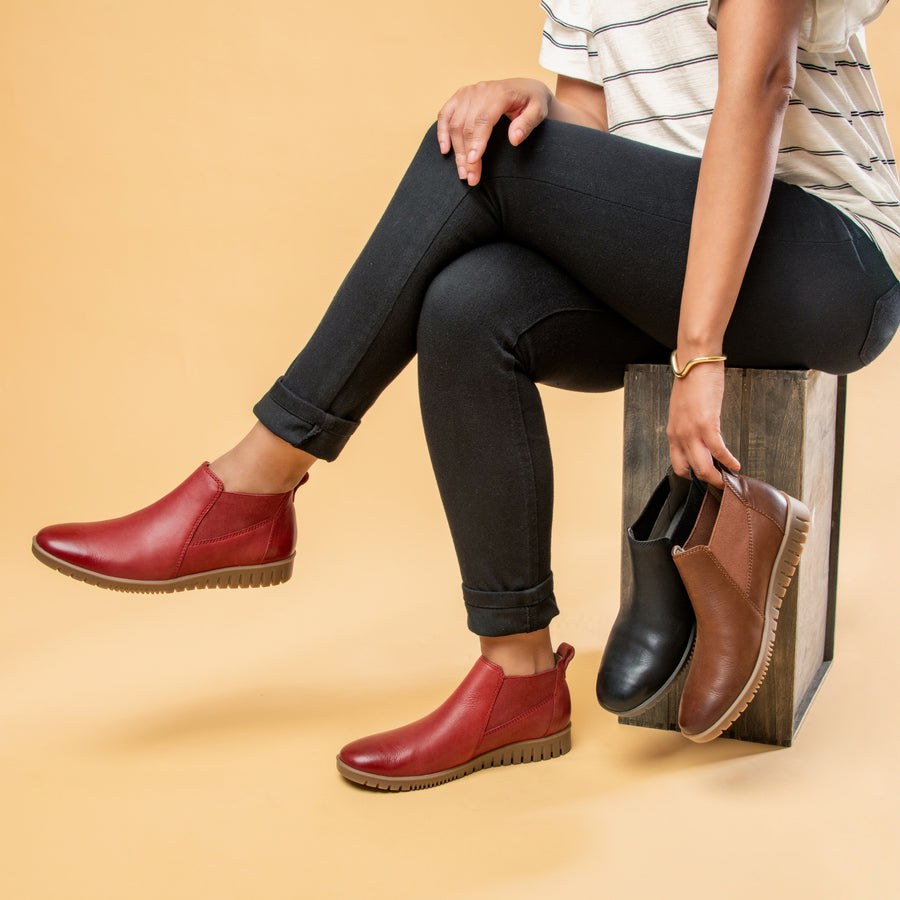 Louisa is a flexible and lightweight bootie with color and style to match. Choose timeless neutrals or subtle pops of color for this versatile bootie to support you wherever you go.
