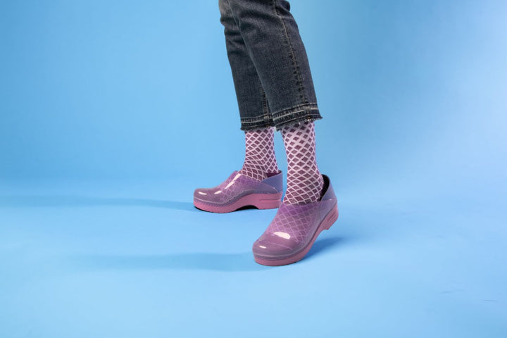 The Purple Translucent Professional clog lets you show your unique style thanks to special jelly-soft TPU uppers in the same classic clog silhouette.